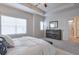 Spacious main bedroom with dresser and en-suite bathroom at 236 Hickory Commons Way, Canton, GA 30115