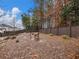 Spacious backyard with a wooden fence and landscaping at 3578 Crayton Glen Way, Buford, GA 30519