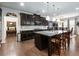 Large kitchen island anchors this gourmet kitchen with stainless steel appliances at 3578 Crayton Glen Way, Buford, GA 30519