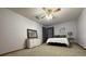 Bright bedroom with ceiling fan, carpeted floor, and ample closet space at 4053 Chapel Mill Bnd, Decatur, GA 30034