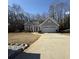 Gray two-story house with attached garage and landscaping at 4053 Chapel Mill Bnd, Decatur, GA 30034