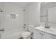 Clean bathroom with white subway tile, a bathtub, and a modern vanity at 1271 Lorenzo Sw Dr, Atlanta, GA 30310