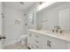 Bathroom featuring double sink vanity, subway tile shower, and updated finishes at 1271 Lorenzo Sw Dr, Atlanta, GA 30310