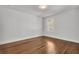 Well-lit bedroom with hardwood floors and a window at 1271 Lorenzo Sw Dr, Atlanta, GA 30310