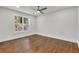 Spacious bedroom with hardwood floors, ceiling fan and large window at 1271 Lorenzo Sw Dr, Atlanta, GA 30310