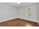 Bright bedroom with wood floors, neutral walls, and white trim create a calming, move-in-ready space at 1271 Lorenzo Sw Dr, Atlanta, GA 30310