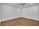 Well-lit bedroom with hardwood floors and a closet at 1271 Lorenzo Sw Dr, Atlanta, GA 30310