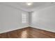 Charming bedroom with hardwood floors and a window at 1271 Lorenzo Sw Dr, Atlanta, GA 30310