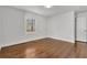 Bedroom featuring hardwood floors, a window, and white walls at 1271 Lorenzo Sw Dr, Atlanta, GA 30310