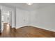 Spacious bedroom with hardwood floors and double doors leading to closet at 1271 Lorenzo Sw Dr, Atlanta, GA 30310