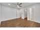 Spacious bedroom with hardwood floors and access to en-suite bathroom at 1271 Lorenzo Sw Dr, Atlanta, GA 30310