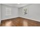 Bedroom with hardwood floors, a window, and neutral paint at 1271 Lorenzo Sw Dr, Atlanta, GA 30310
