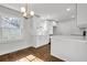 Modern kitchen with white shaker cabinets, quartz countertops and stainless steel appliances at 1271 Lorenzo Sw Dr, Atlanta, GA 30310