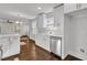 Updated kitchen with white cabinets, stainless steel appliances and hardwood floors at 1271 Lorenzo Sw Dr, Atlanta, GA 30310