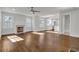 Spacious living room with hardwood floors, fireplace and open concept layout at 1271 Lorenzo Sw Dr, Atlanta, GA 30310