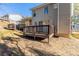 Backyard featuring a house and a wooden deck in need of repair at 3950 Fennel Sw Cir, Atlanta, GA 30331