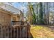 Exterior of a home featuring a back deck, lawn and wooded area at 3950 Fennel Sw Cir, Atlanta, GA 30331