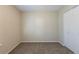 Neutral bedroom featuring carpet flooring and a closet, ready for personalization at 3950 Fennel Sw Cir, Atlanta, GA 30331