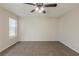 Bedroom featuring ceiling fan and a large window at 3950 Fennel Sw Cir, Atlanta, GA 30331