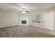Inviting living room featuring a classic fireplace and a ceiling fan at 3950 Fennel Sw Cir, Atlanta, GA 30331