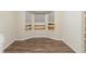 Cozy room with wood-look floors and bright bay windows at 3950 Fennel Sw Cir, Atlanta, GA 30331