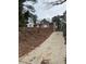 Brick house with a long driveway leading up to the home at 1915 Campbellton Sw Rd, Atlanta, GA 30311