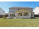 Charming home with a covered patio and spacious backyard at 2044 Garvin Rd, Acworth, GA 30101