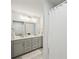 Double vanity bathroom with modern fixtures and a shower at 2044 Garvin Rd, Acworth, GA 30101