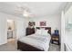 Well-lit bedroom with a double bed and ensuite bathroom access at 2044 Garvin Rd, Acworth, GA 30101