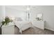 Charming bedroom with a queen bed and white dresser at 2044 Garvin Rd, Acworth, GA 30101