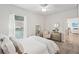 Cozy bedroom with carpeted floors and a large window at 2044 Garvin Rd, Acworth, GA 30101