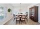 Formal dining room with hardwood floors and a built-in hutch at 2044 Garvin Rd, Acworth, GA 30101