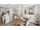 Bright dining area adjacent to kitchen with seating for four at 2044 Garvin Rd, Acworth, GA 30101