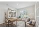 Charming home office featuring built-in shelving and comfortable seating at 2044 Garvin Rd, Acworth, GA 30101