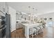 Modern kitchen with island, stainless steel appliances & white cabinets at 2044 Garvin Rd, Acworth, GA 30101