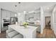 Spacious kitchen, featuring a large island, stainless steel appliances, and white cabinetry at 2044 Garvin Rd, Acworth, GA 30101