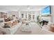 Bright living room features a fireplace, large windows, and comfortable seating at 2044 Garvin Rd, Acworth, GA 30101