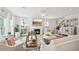 Bright and airy living room with hardwood floors and a cozy fireplace at 2044 Garvin Rd, Acworth, GA 30101