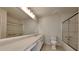 Clean bathroom with updated vanity, large mirror, and shower/tub combo at 2395 River Run Dr, Douglasville, GA 30135