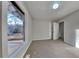 Well-lit bedroom with window offering a view and neutral decor at 2395 River Run Dr, Douglasville, GA 30135