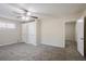 Bedroom featuring neutral carpet, closet space, and natural light at 3418 Longleaf Dr, Decatur, GA 30032