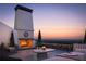 Rooftop terrace with fireplace and city views at 225 Mayfair Ct, Alpharetta, GA 30009