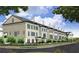 Exterior view of a row of attractive townhouses at 225 Mayfair Ct, Alpharetta, GA 30009
