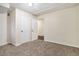 Bedroom with neutral walls and carpeting and two closets at 2876 Battle Forrest Dr, Decatur, GA 30034
