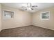 Spacious bedroom with neutral carpeting and two windows at 2876 Battle Forrest Dr, Decatur, GA 30034