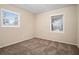 Well-lit bedroom featuring neutral walls and carpeting at 2876 Battle Forrest Dr, Decatur, GA 30034