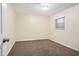 Spacious carpeted bedroom with one window at 2876 Battle Forrest Dr, Decatur, GA 30034