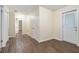 Bright hallway with wood-look flooring and access to other rooms at 2876 Battle Forrest Dr, Decatur, GA 30034