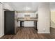 Updated kitchen with stainless steel appliances and granite countertops at 2876 Battle Forrest Dr, Decatur, GA 30034
