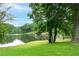 Scenic view of the lake and lush greenery at 7434 Woodruff Way, Stone Mountain, GA 30087